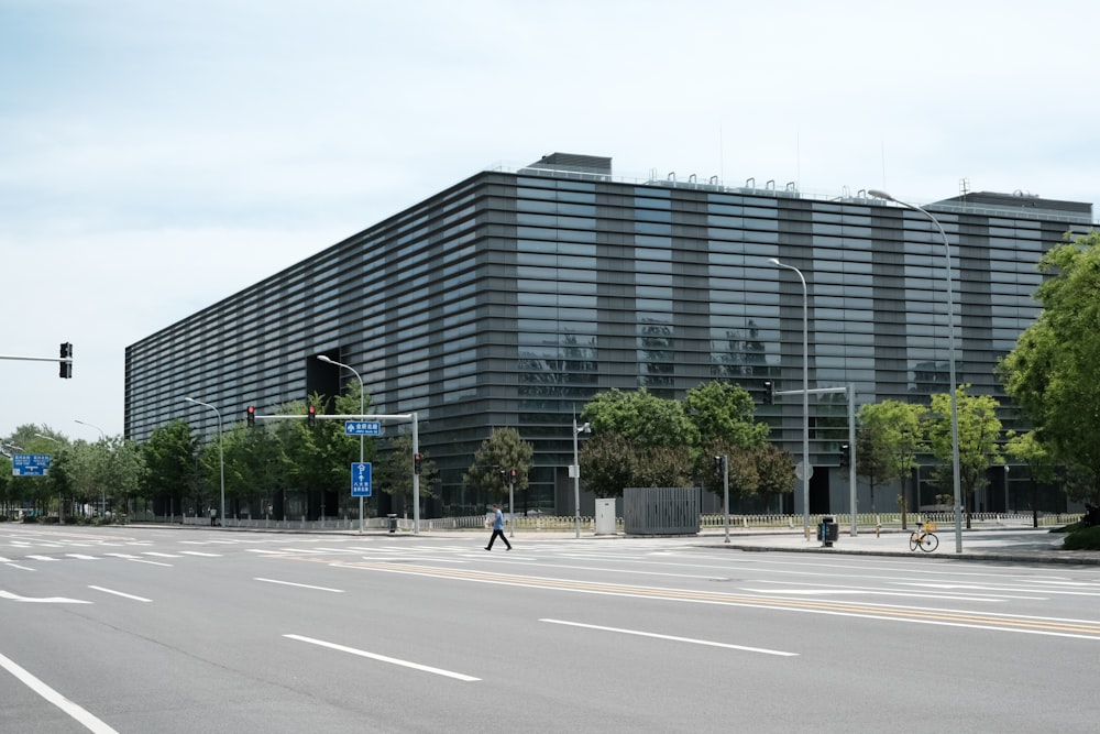 a large building sitting on the side of a road