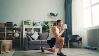 a man is running in a living room