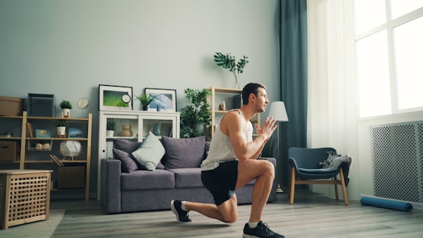 a man is running in a living room