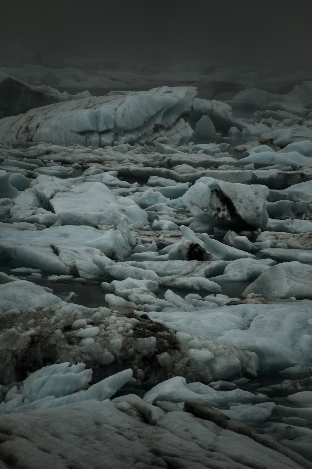 a large amount of ice on the ground