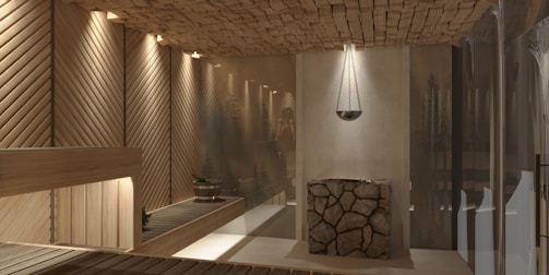 a bathroom with a wooden ceiling and a glass shower