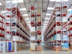 a large warehouse filled with lots of shelves
