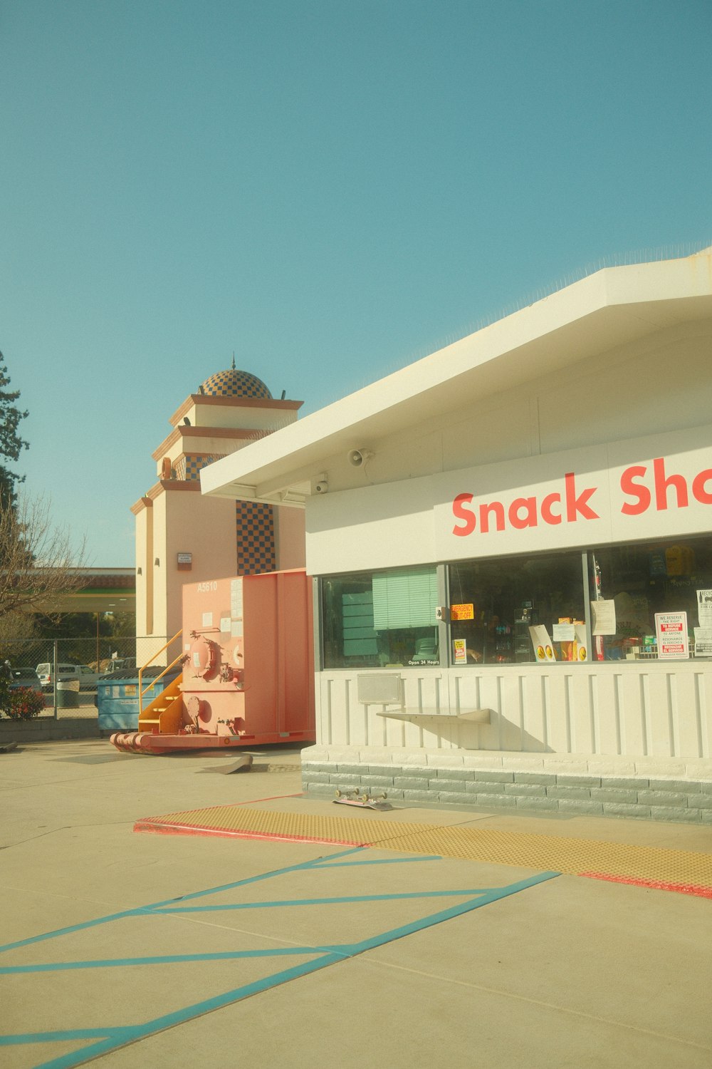 a snack shop with a sign that says snack shop