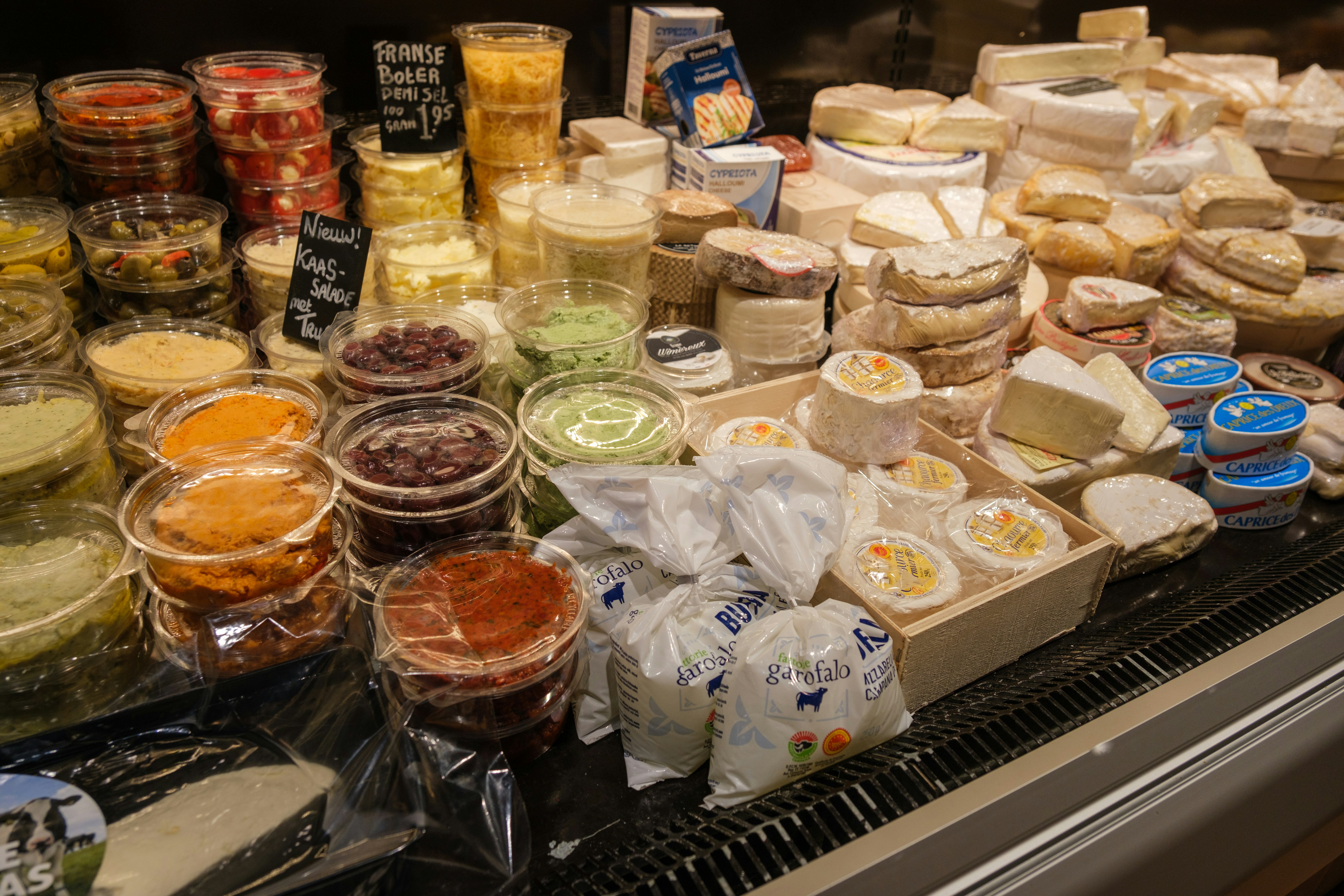 Diverse and appealing buffet spread with clear labels - Corporate Event Catering