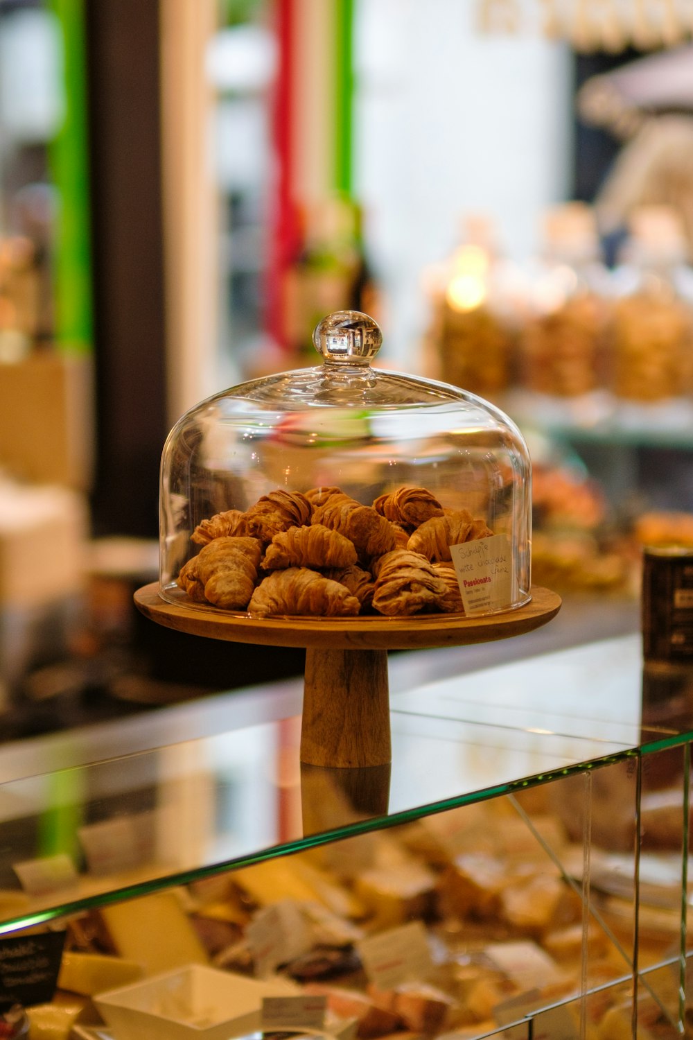 a display case filled with lots of pastries