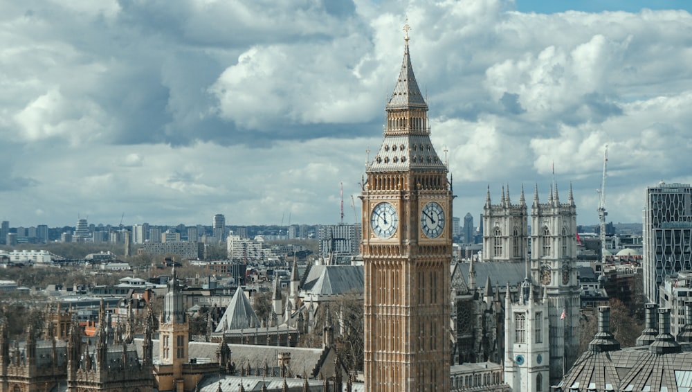 a large clock tower towering over a city