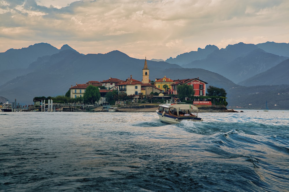 a boat traveling down a body of water