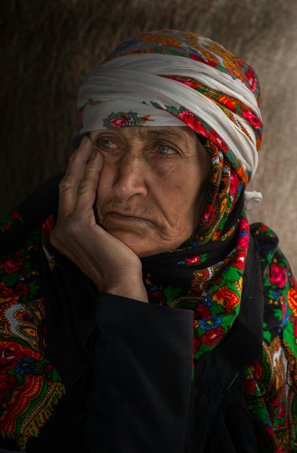 a woman with a head scarf on her head