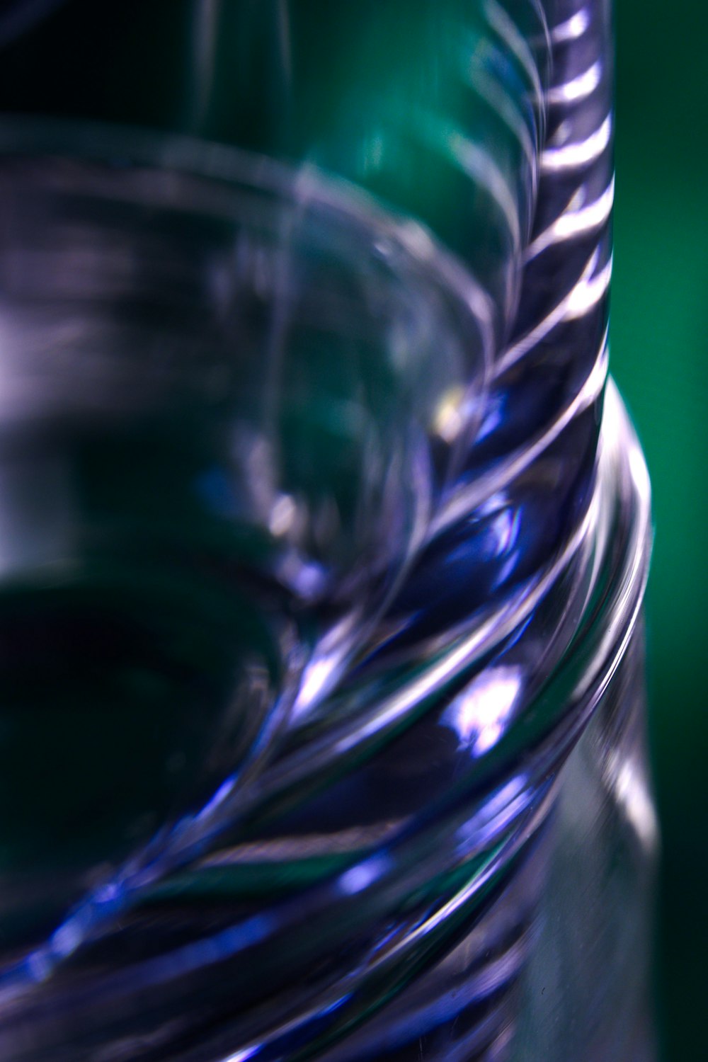 a close up of a glass with a blurry background