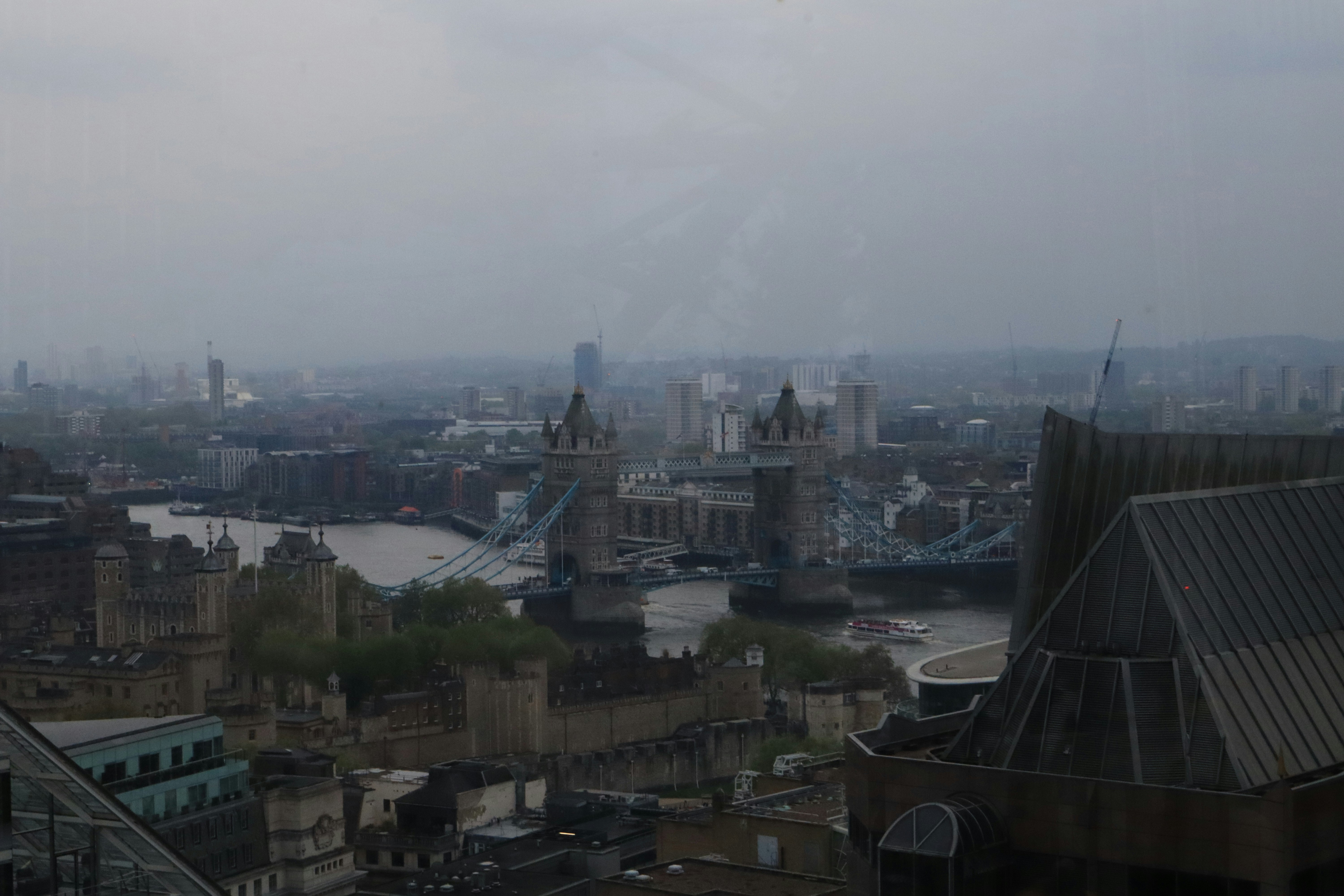 View across London with Tower Bridge and surrounding city buildings