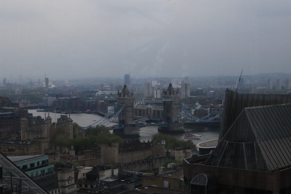 a view of the city of london from the top of a building