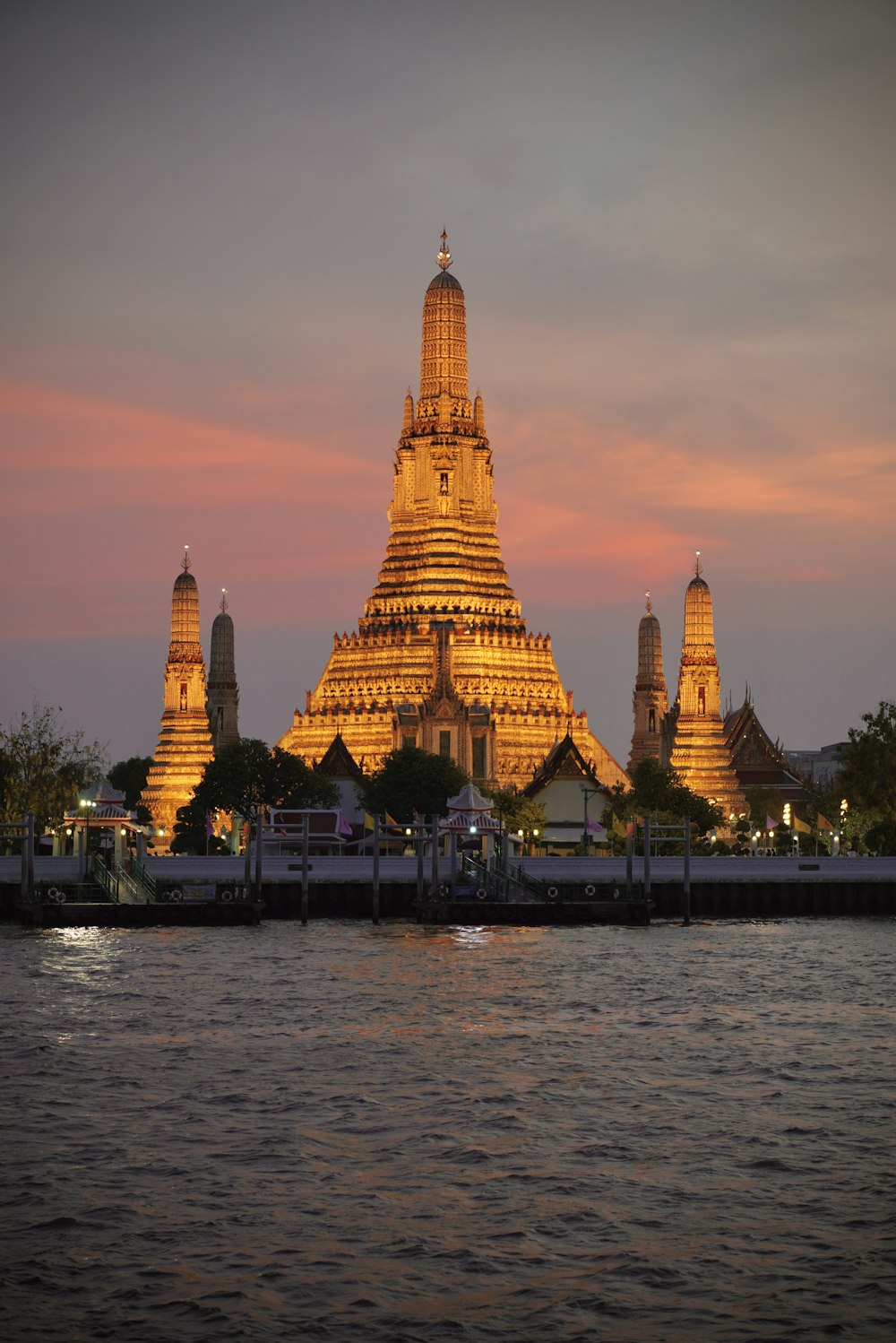 a large building sitting on top of a river