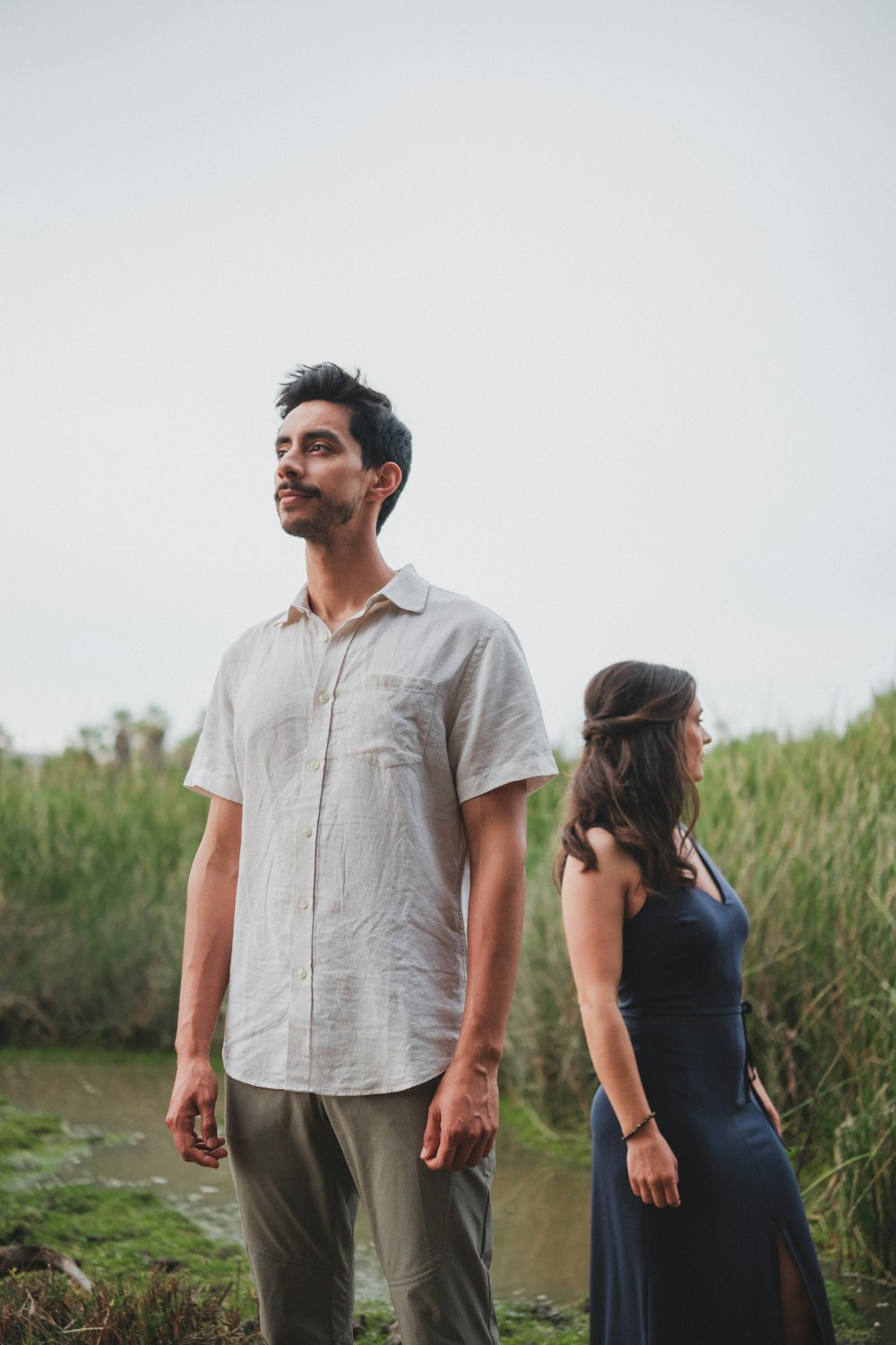 a man and a woman standing next to each other