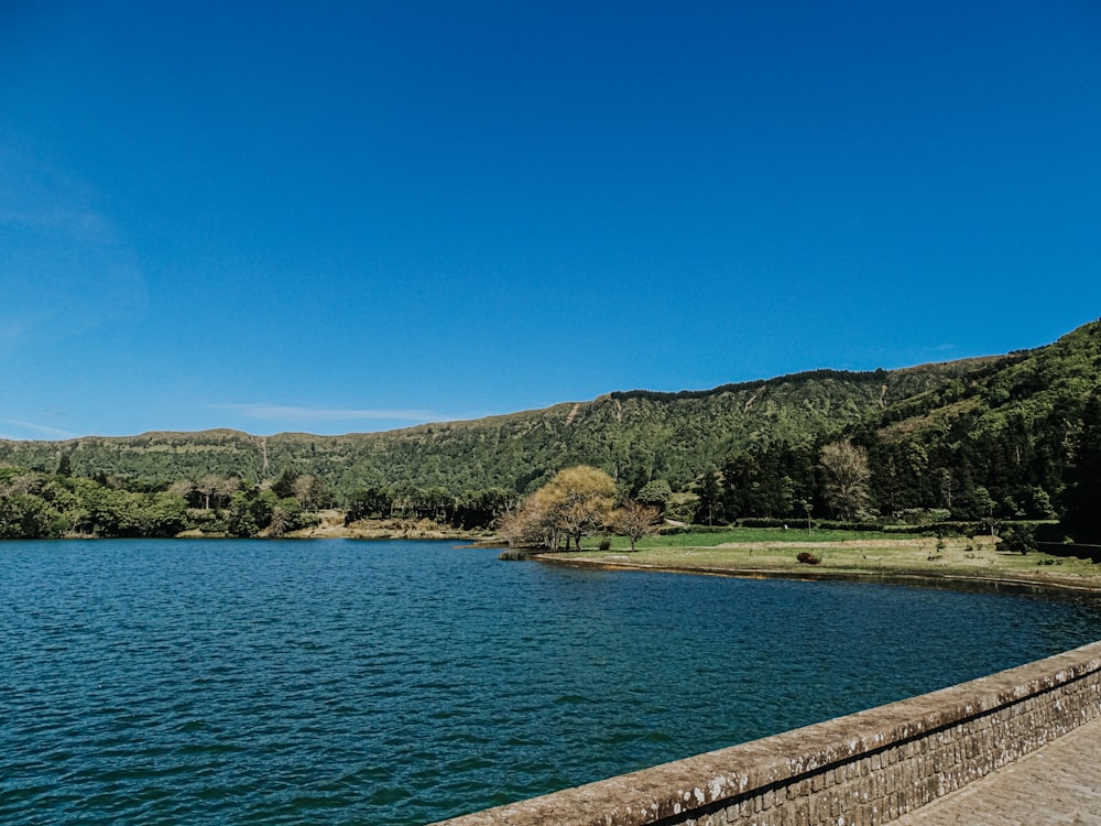 a large body of water surrounded by mountains