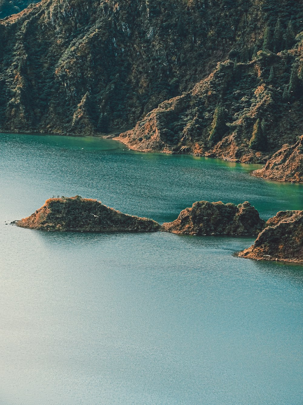 a large body of water surrounded by mountains