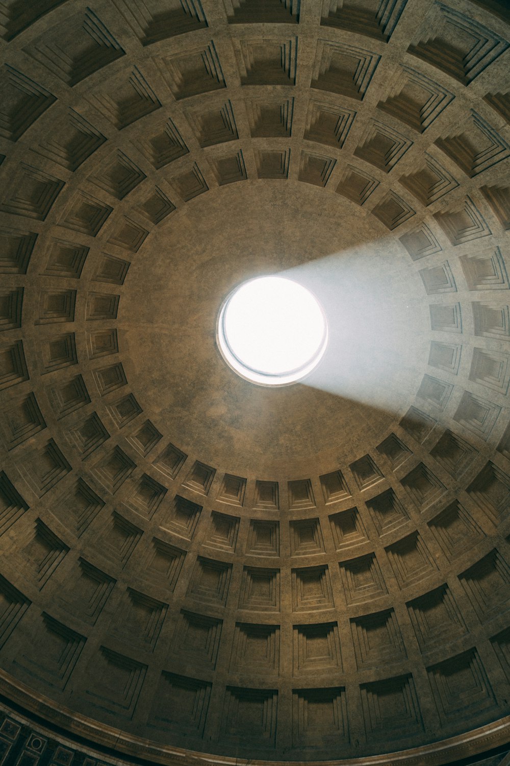 a light shines in the center of a dome