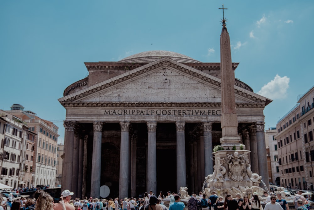 a group of people standing in front of a building