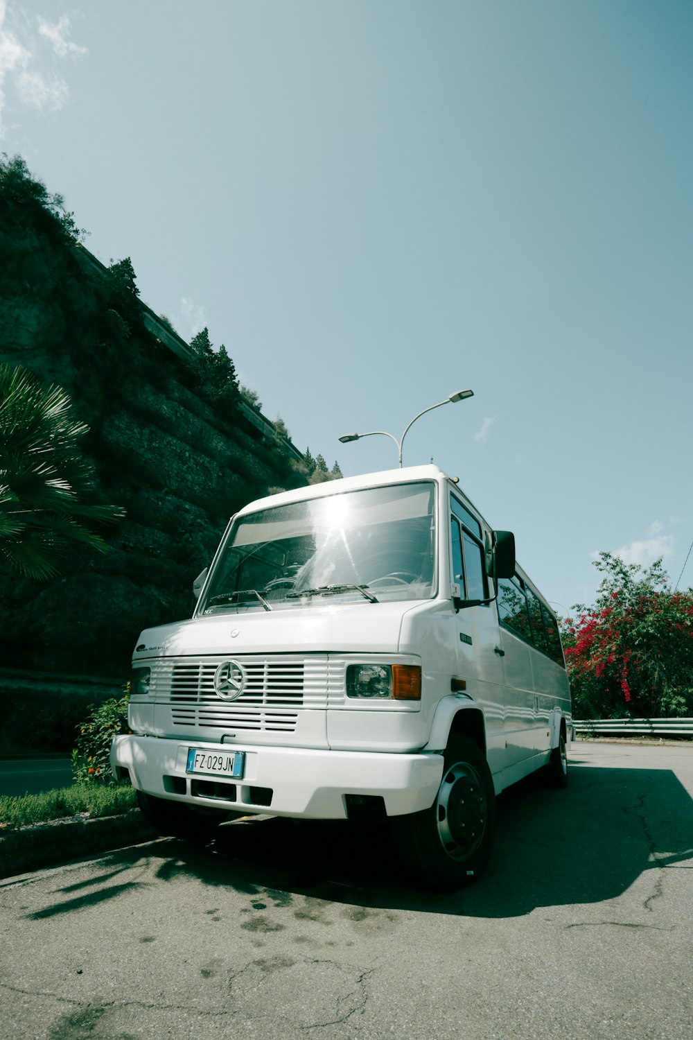 a white van parked on the side of a road