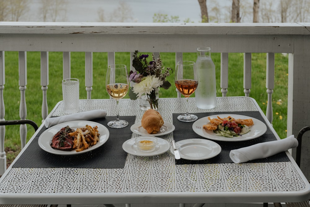 a table that has plates of food on it