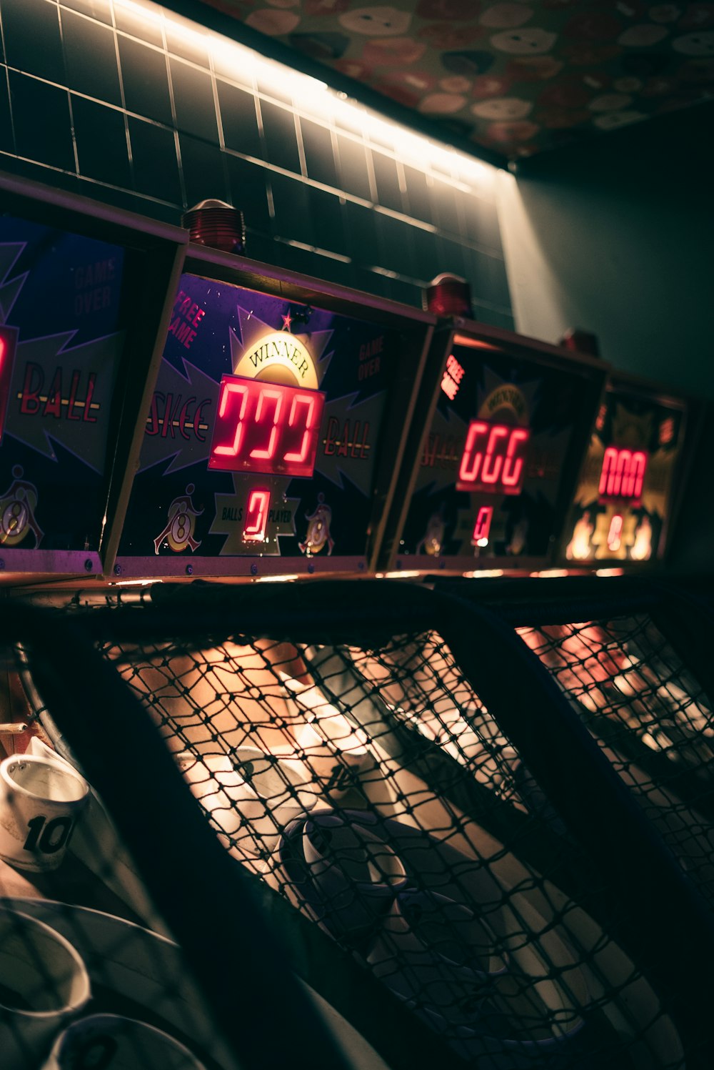 a row of slot machines sitting next to each other