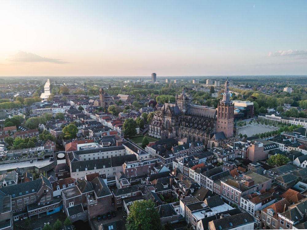 an aerial view of a city with tall buildings