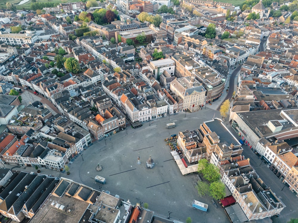 an aerial view of a city with lots of buildings