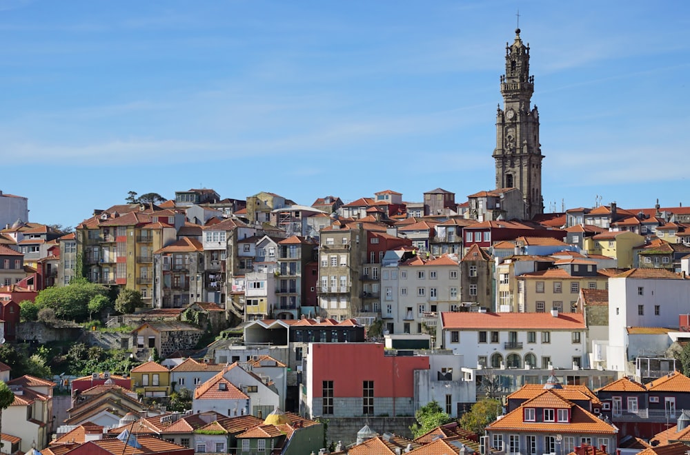 a view of a city with a clock tower in the background