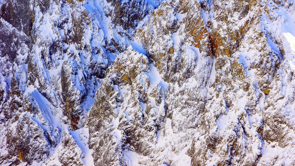 a very tall mountain covered in lots of snow