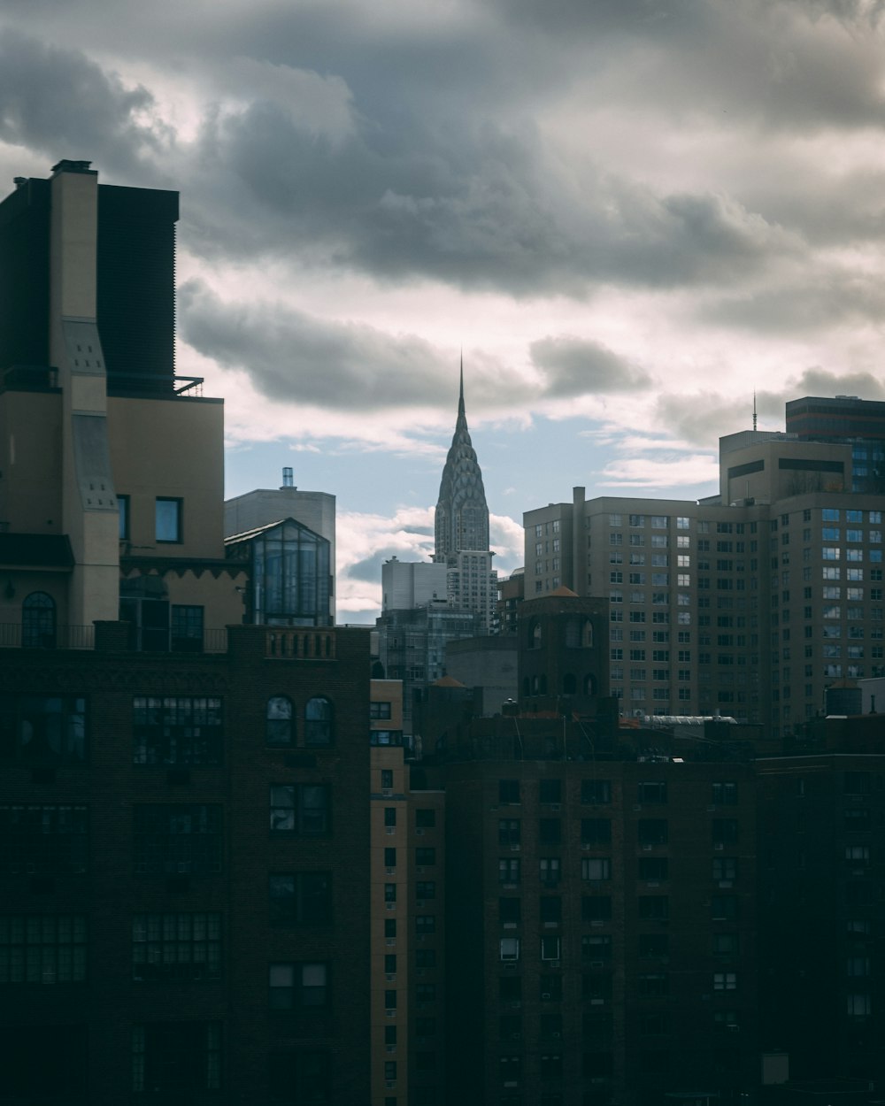 a view of a very tall building in the city