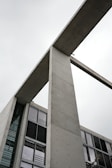 a tall building with a clock on the side of it