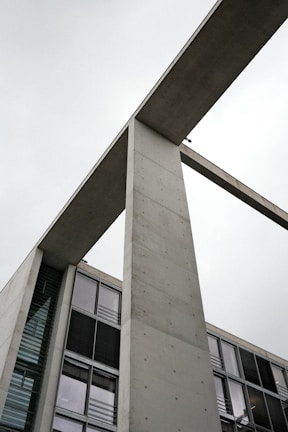 a tall building with a clock on the side of it