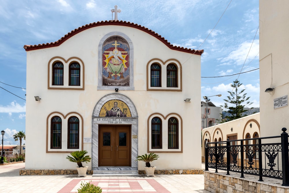 a church with a cross on the front of it