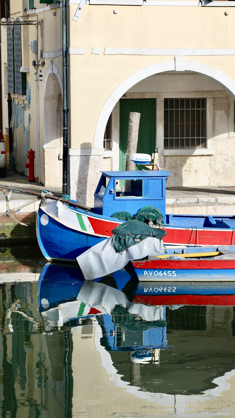 a couple of boats that are sitting in the water