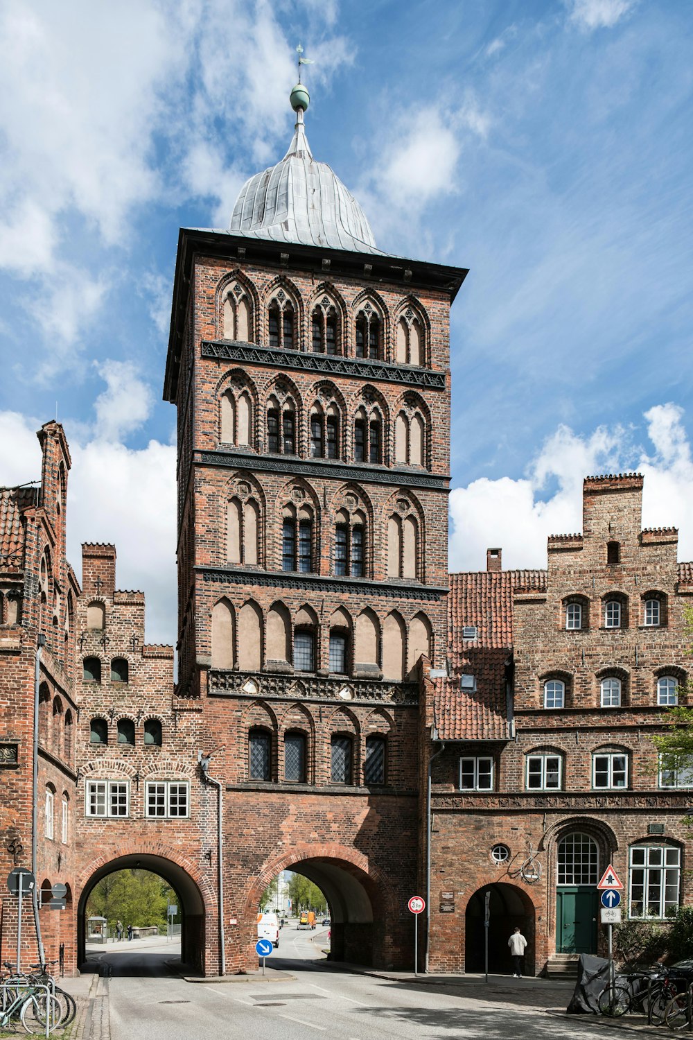 a tall brick building with a clock tower