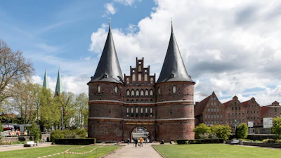 a castle like building with a walkway leading to it