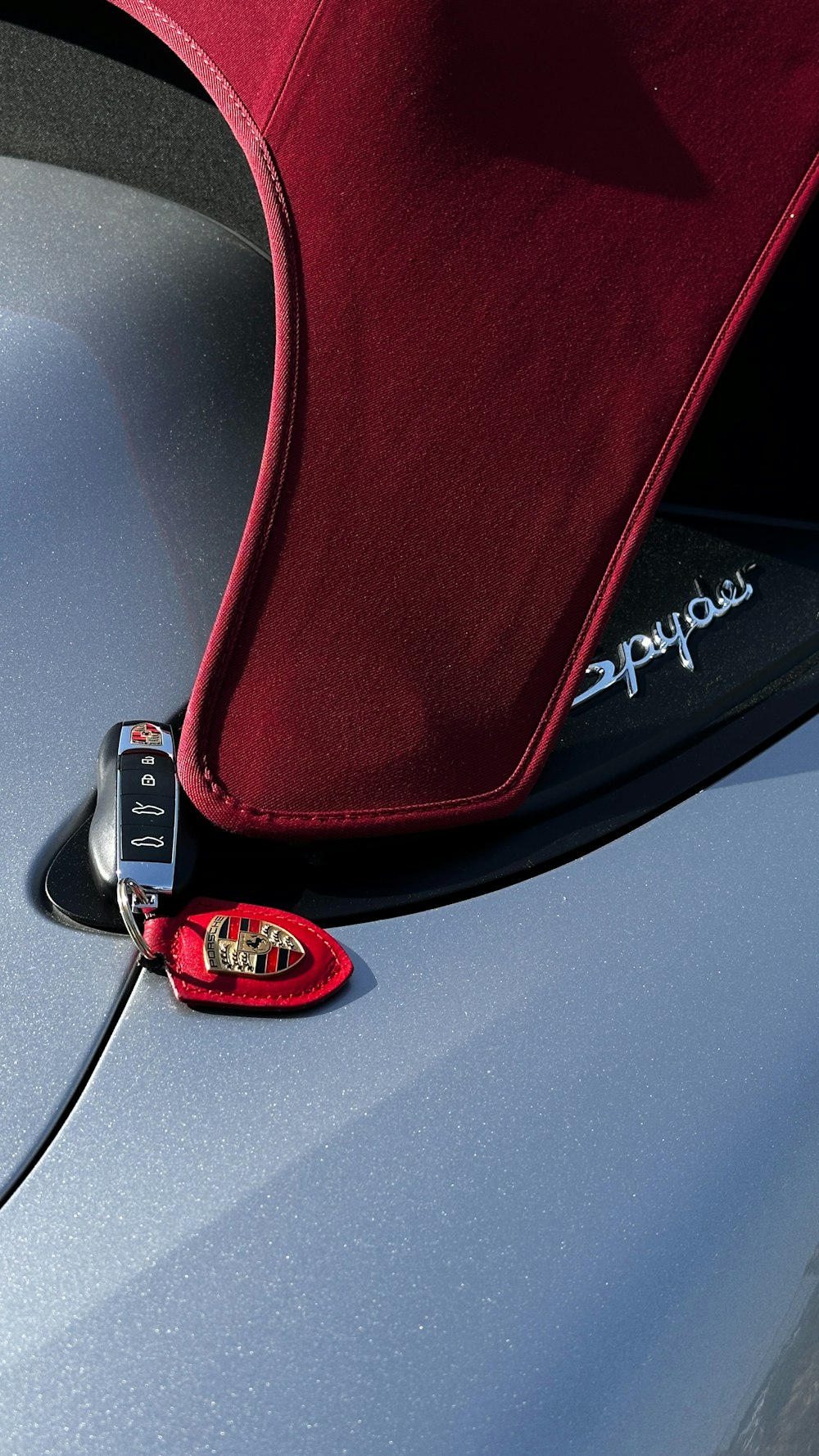 a close up of a car's hood with a car key