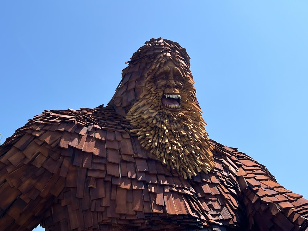 a large statue of a man with a beard