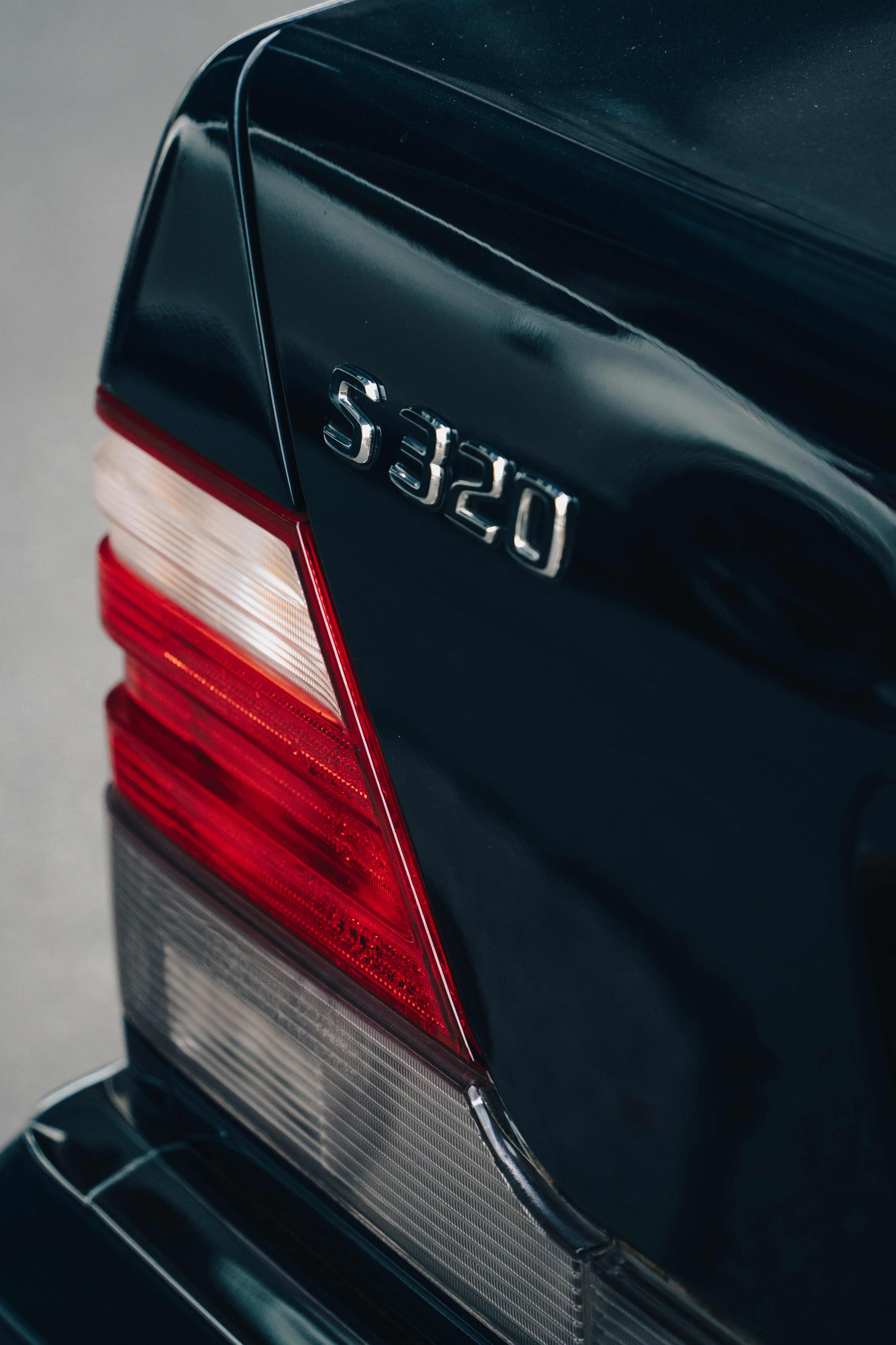 The rear end of a black mercedes benz benz benz benz benz benz benz ...