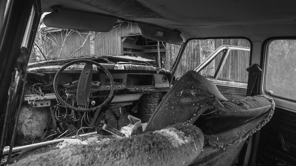 a black and white photo of an old truck