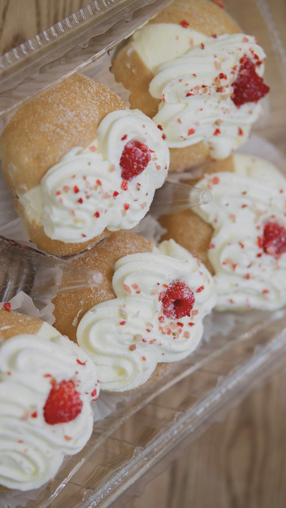 a close up of a tray of pastries on a table