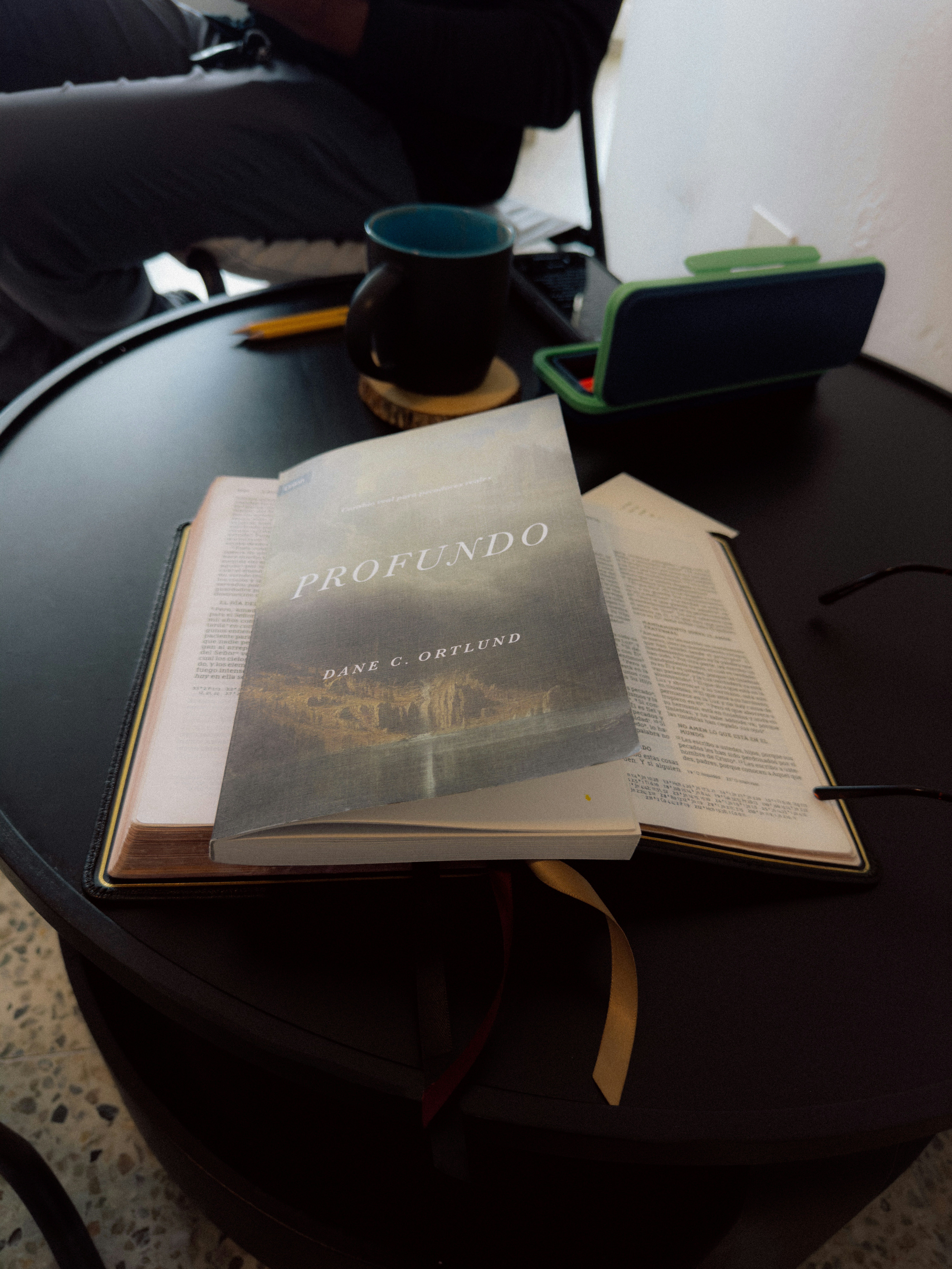 an open book sitting on top of a table