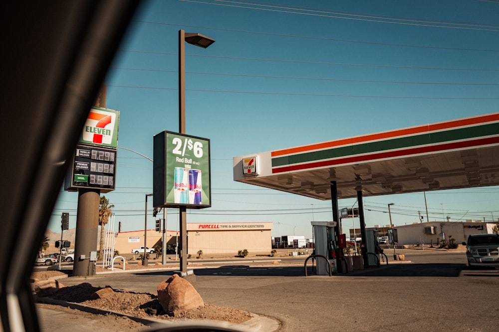 a gas station with a sign for a gas station