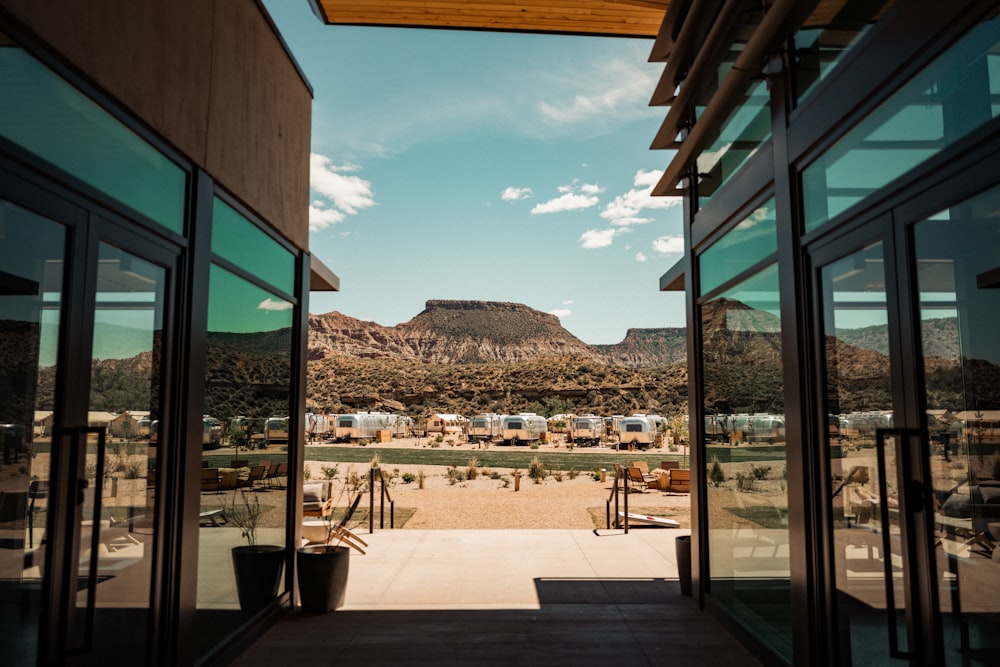 a view of a mountain from inside a building