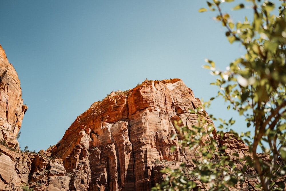 a large rock formation in the middle of a desert