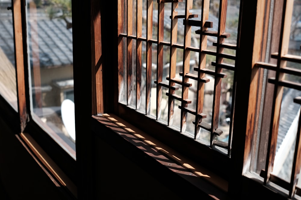 a window with bars on the side of it