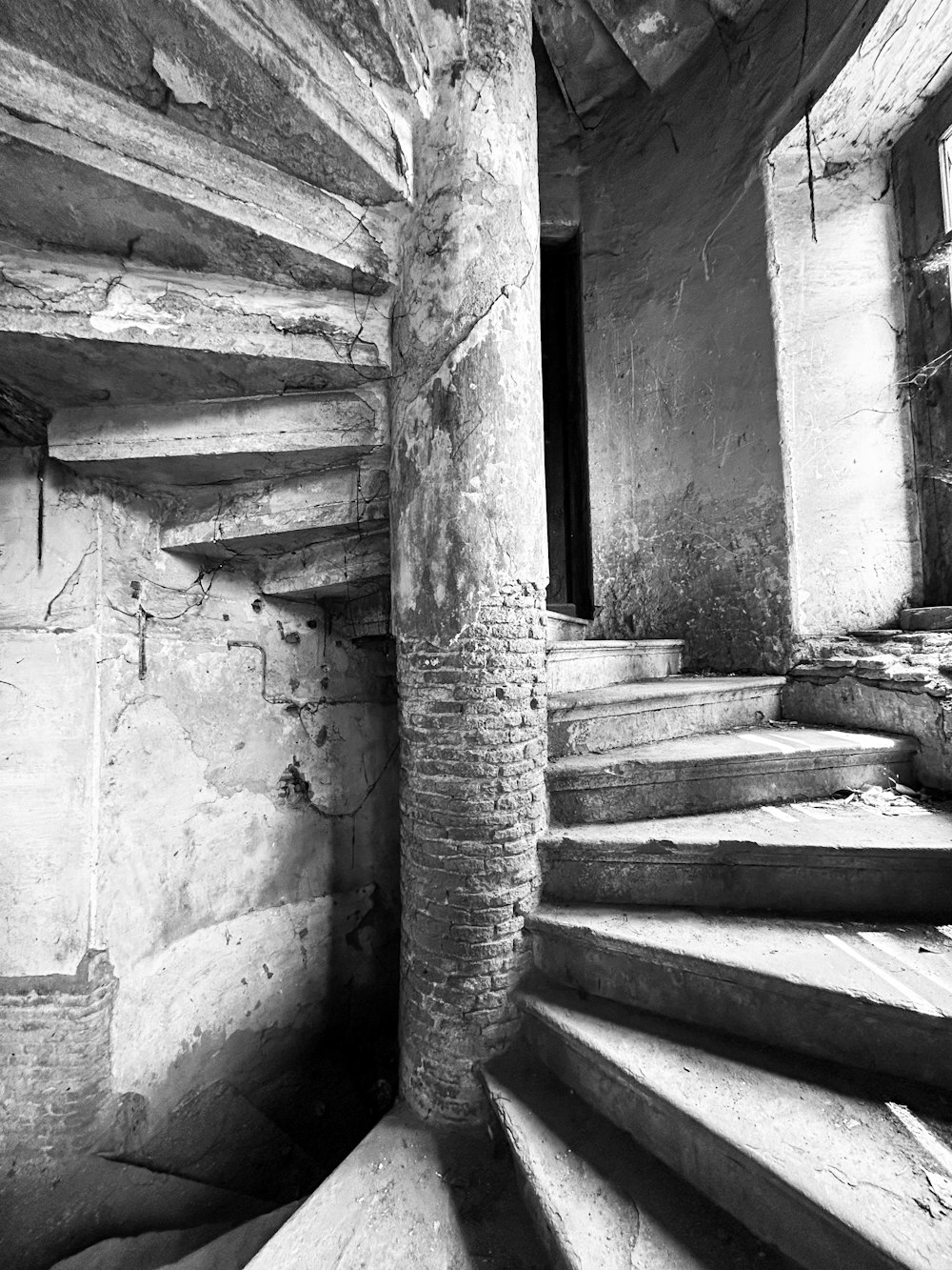 a black and white photo of a set of stairs