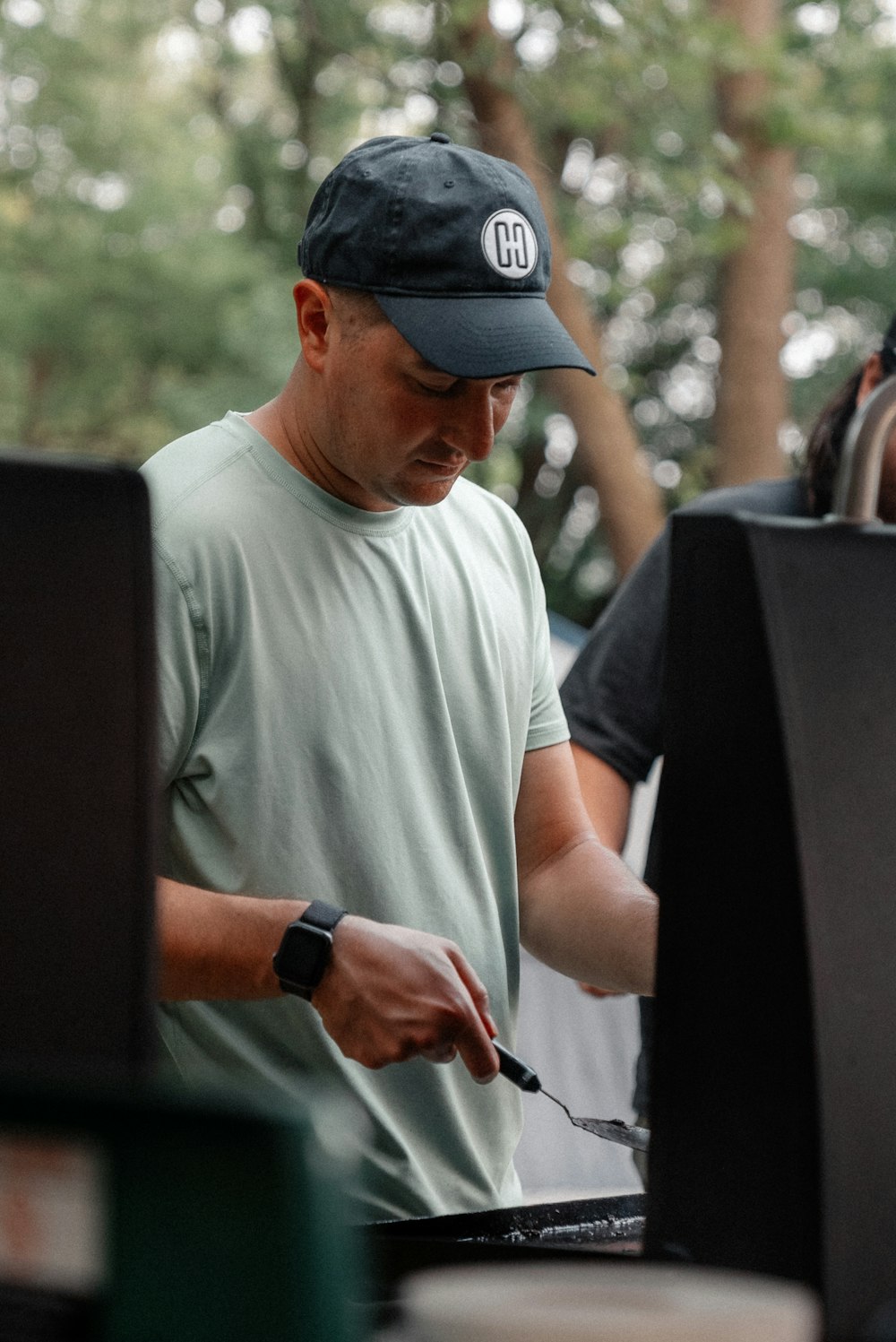 a man is grilling food on a grill