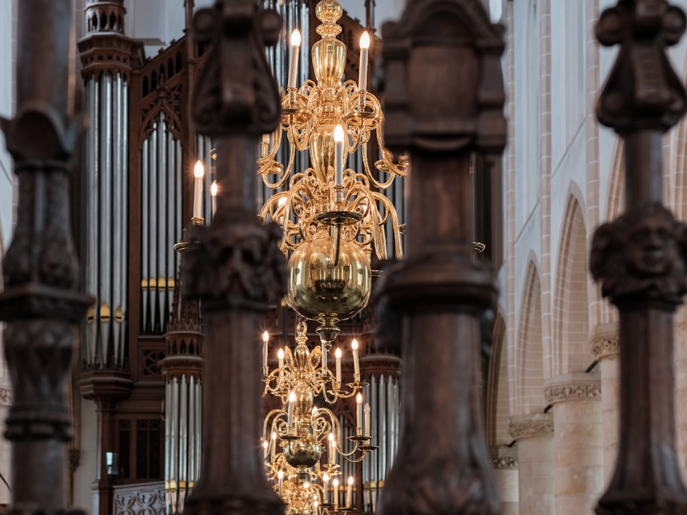 a chandelier hanging from the ceiling of a church