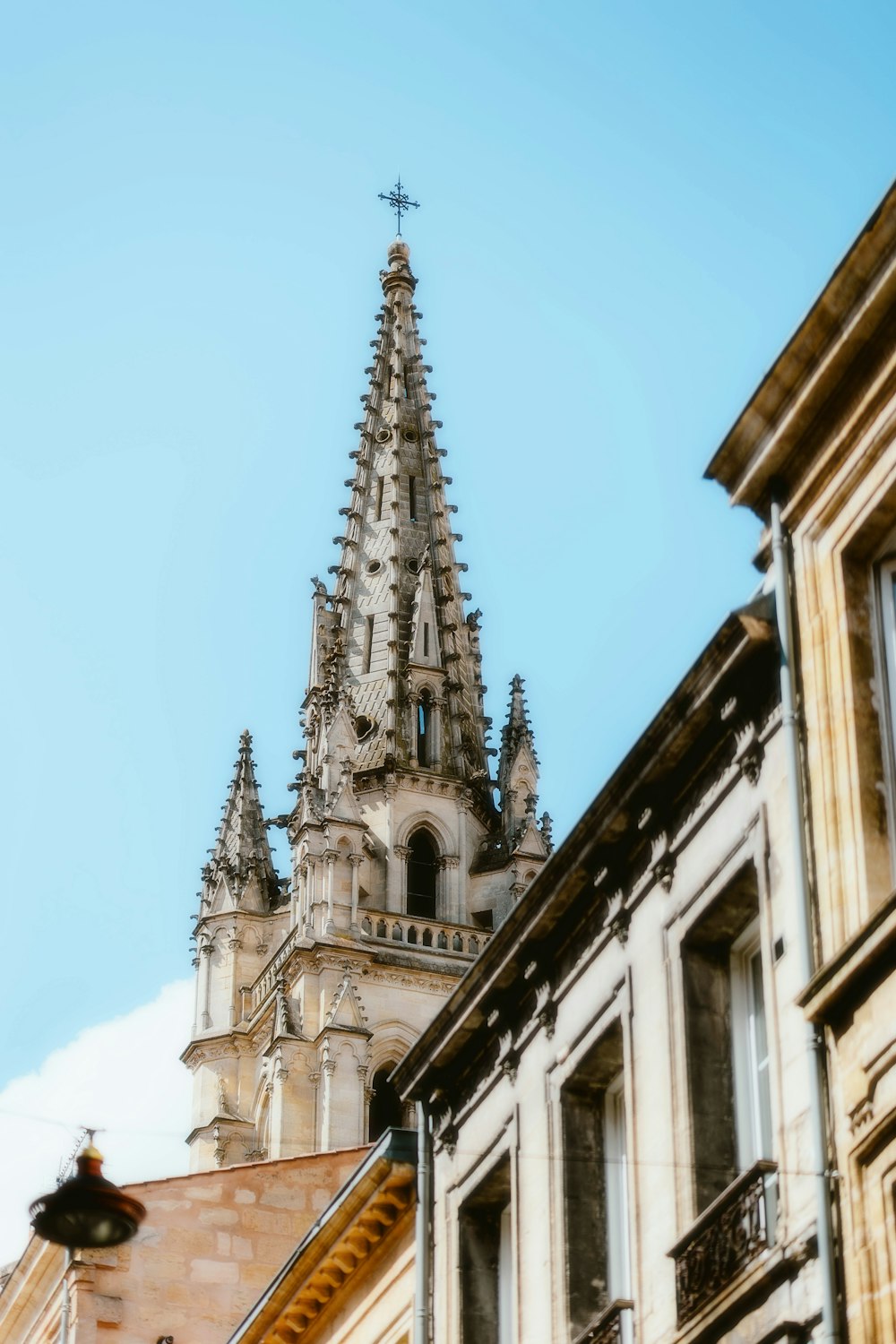 a tall building with a clock on it's side