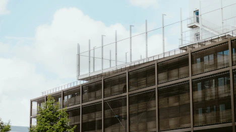 a tall building with a clock on the side of it